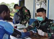 Yonif TP 819/PIBP Bersama Puskesmas Gelar Imunisasi dan Pengobatan Gratis di Kampung Yangpop