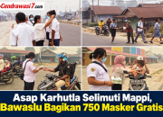 Asap Karhutla Selimuti Mappi, Bawaslu Bagikan 750 Masker Gratis